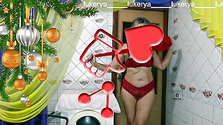 Hot housewife Lukerya brings a festive mood showing off red lingerie with flirting on webcam.