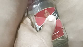 Bhabi pissing in rum bottle
