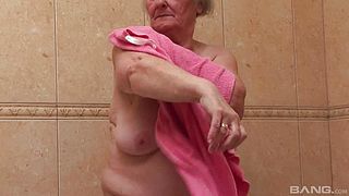 Granny catches cock walking on Frat Row and takes it home to suck and fuck