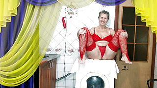 And again, exciting red lingerie on the delightful middle-aged body of the cheerful Lukerya, who flirts freely in the we