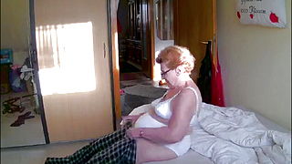 Granny getting dressed in white underwear